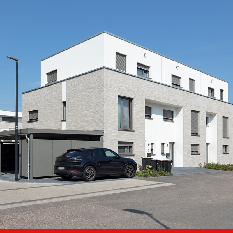 Modernes Reihenhaus mit Auto und Garage